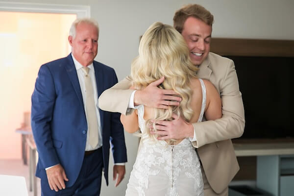 A first loom with the bride, her father, and her brother.