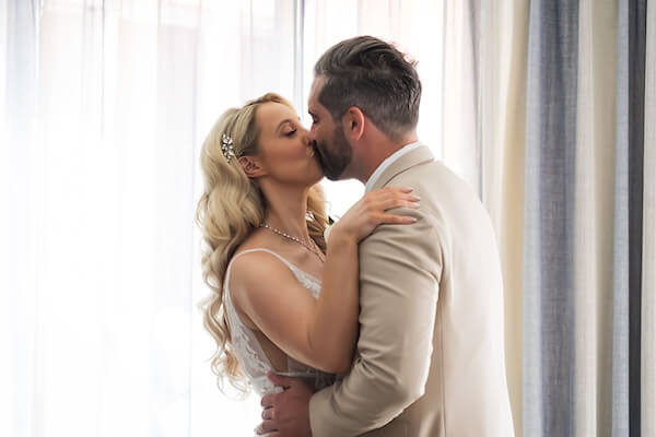 A bride and groom's first look at their Hyatt Regency Clearwater Beach.