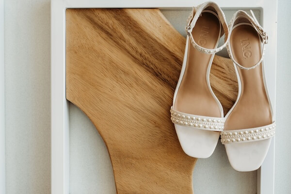 Pearl studded wedding shoes for a beach-themed wedding.