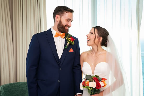 Bride and groom's first look at the Opal Sands.