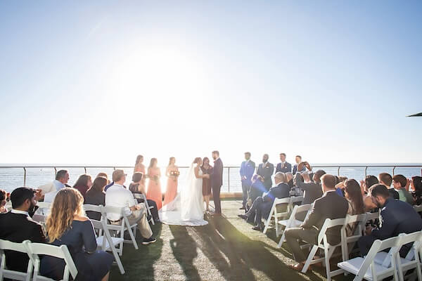 Wedding ceremony on the event lawn at the Opal Sands.