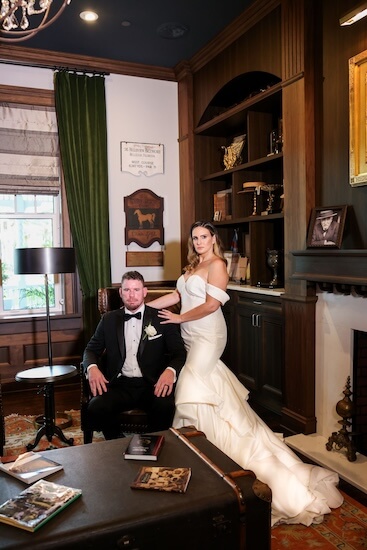 Newlyweds in the library at the Belleview Inn.