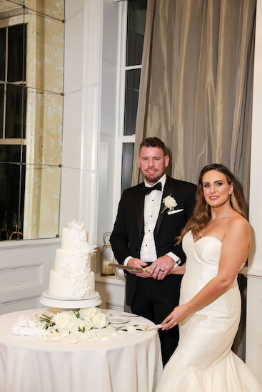 Couple cutting their wedding cake!