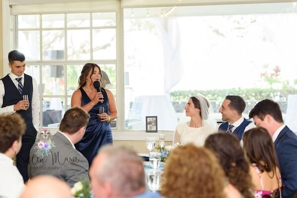 Touching toasts at a Davis Islands Garden Club afternoon wedding reception.