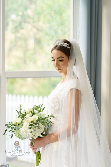 A Tampa bride preparing at home for her afternoon wedding.