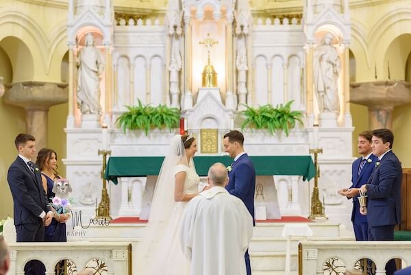 An afternoon wedding ceremony at Sacred Heart Catholic church in Tampa.