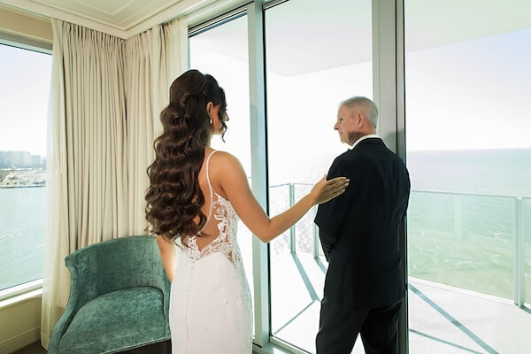 A bride having dad time beofre her clearwater wedding.