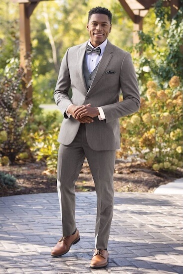 A groom dressed by Jim's Formal Wear for a destination wedding.