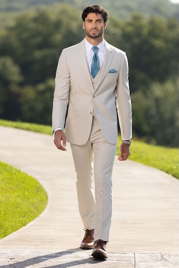 A groom dressed by Jim's Formal Wear for a destination wedding.