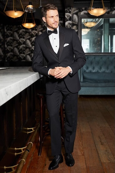 Groom dressed by Jim's Formal Wear.