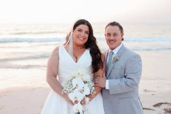 Bride and Groom on Clearwater Beach at sunset.