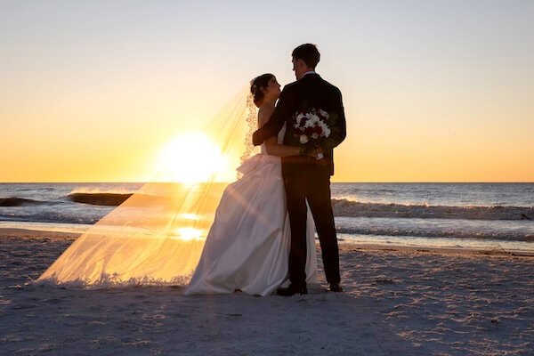 Sunset wedding portraits on Clearwater Beach.