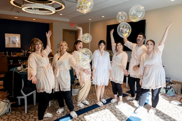 A bride and wher wedding party having fun beofre her Clearwater wedding.