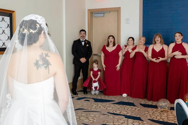 A bride's first look with her wedding party.