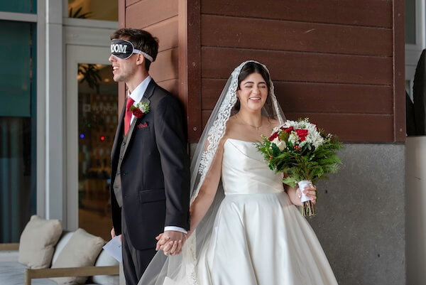 A bride and groom's first touch before their Clearwater wedding.