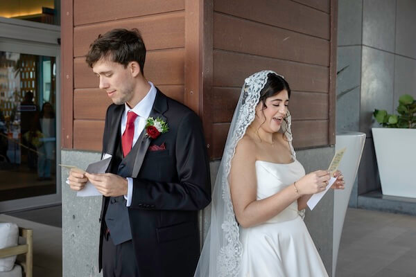 A bride and groom's first touch before their Clearwater wedding.