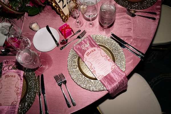 Gold filagree charger plates by A Chair Affair for a Sand Key wedding.