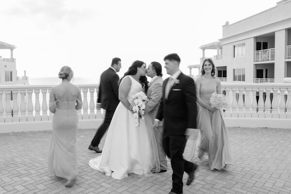 Newlyweds and their wedding party on the Hyatt Regency Clearwater Beach's Sky Terrace.