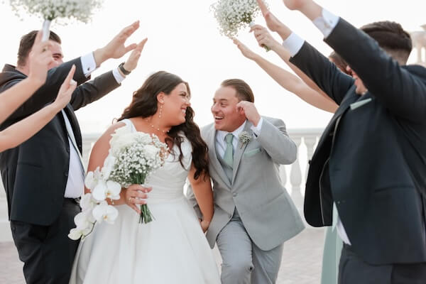 Newlyweds and their wedding party on the Hyatt Regency Clearwater Beach's Sky Terrace.