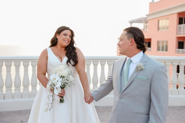 A bride and groom on the Hyatt Regency Clearwater Beach's Sky Terrace.