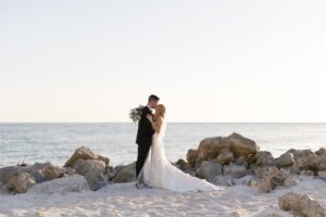 Bride and groom on Clearwater Beach after their Opal Sands Resort wedding.