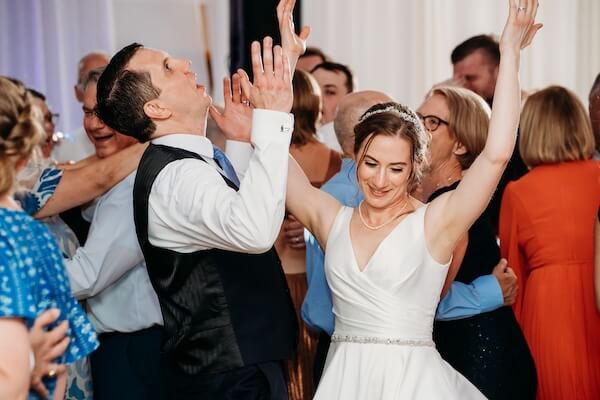 A newlywed bride and groom dancing the night away at their downtown St. Pete wedding!