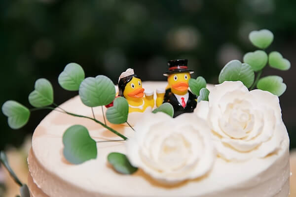 Bride and groom ducks make an adorable cake topper.
