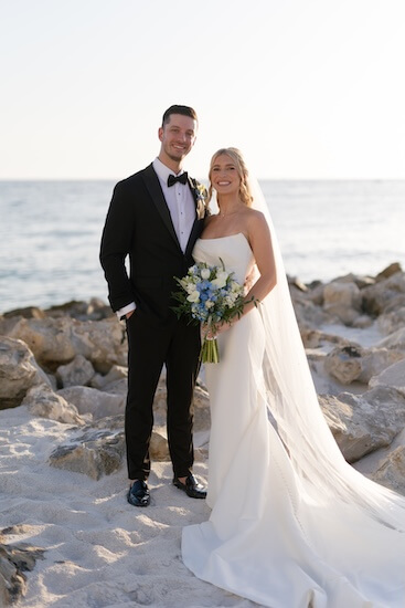 A newlywed couple's wedding portraits after their Opal Sands Resort wedding.