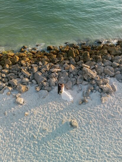 A newlywed couple's wedding portraits after their Opal Sands Resort wedding.