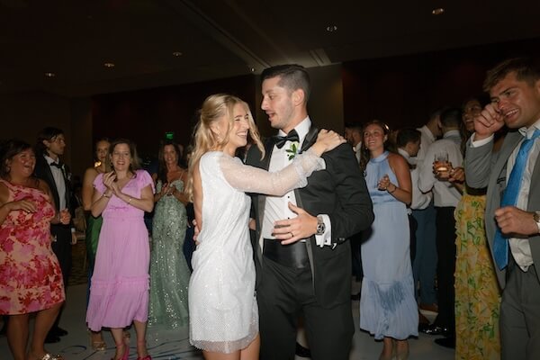 A bride and groom dancing the night away at their Opal Sands Resort wedding reception.