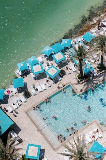 Aerial view of the pool and deck of the Opal Sands Resort in Clearwater, Florida.