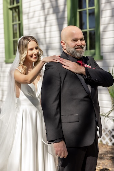 The bride and groom's first look before their Tampa Bay wedding.