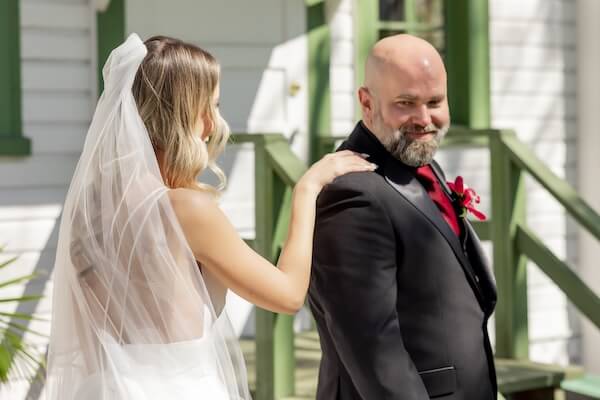 The bride and groom's first look before their Tampa Bay wedding.