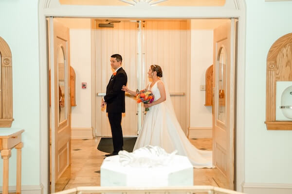 A bride and groom's first look just before their St. Pete wedding ceremony.