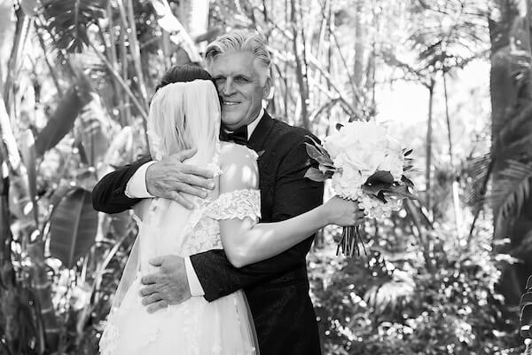 A bride and her father's first look on her wedding day at Sunken Gardens in St. Petersburg, Florida.