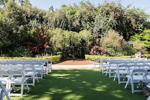 Setup for a beautiful outdoor wedding ceremony at Sunken Gardens in St. Petersburg, Florida.