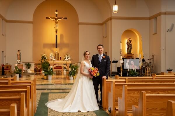 A bride and groom taking wedding portraits after their St. Pete wedding.