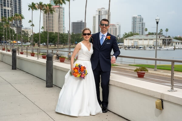 A bride and groom taking wedding portraits after their St. Pete wedding.