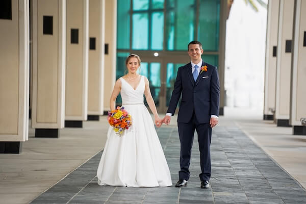 A bride and groom taking wedding portraits after their St. Pete wedding.