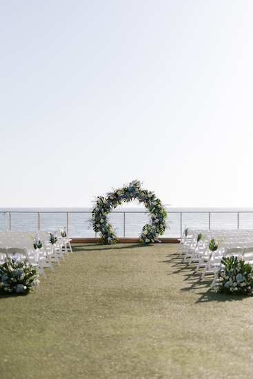 An outdoor wedding ceremony overlooking the Gulf of Mexico at the Opal Sands Resort on Clearwater Beach.