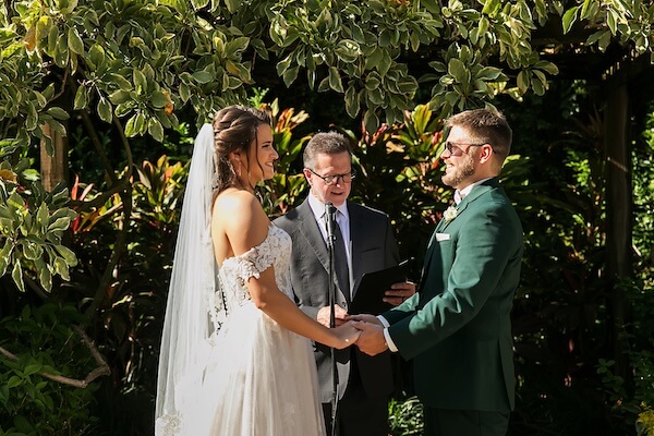 An outdoor wedding ceremony at Sunken Gardens in St. Petersburg, Florida.