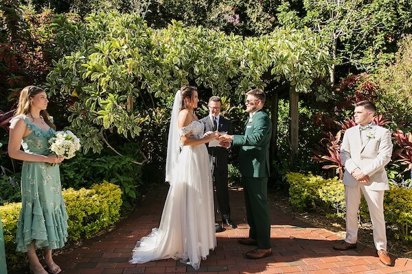 An outdoor wedding ceremony at Sunken Gardens in St. Petersburg, Florida.