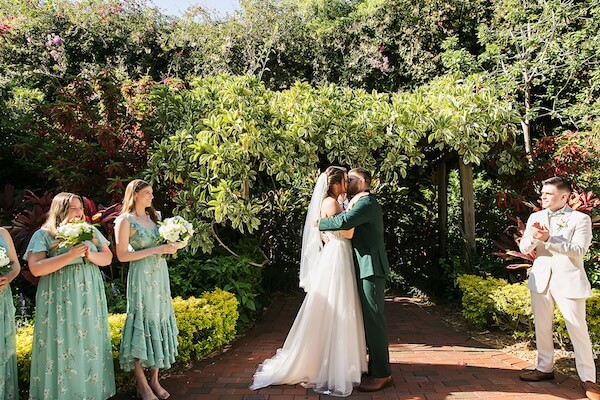 An outdoor wedding ceremony at Sunken Gardens in St. Petersburg, Florida.