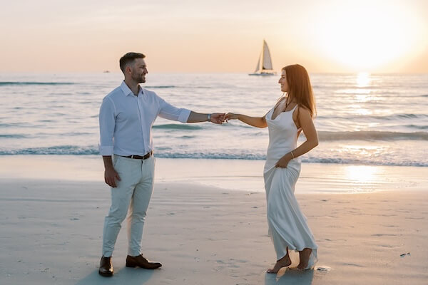 A newlywed couple on Clearwater Beach at sunset!