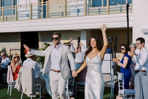 A newlywed couple making their entrance at their Clearwater Beach wedding reception.