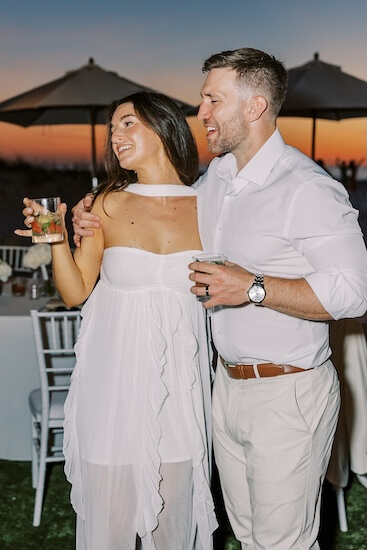 A newlywed couple during their Clearwater Beachfront wedding reception.