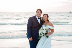 A bride and groom enjoying golden hour on Clearwater Beach.