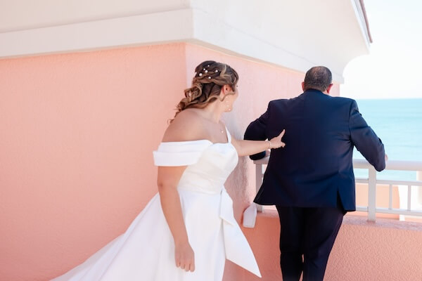 The father of the bride's first look at his daughter's wedding day.