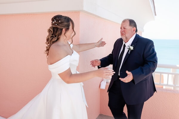 The father of the bride's first look at his daughter's wedding day.