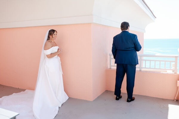 The bride and groom's first look photo session before their Clearwater Beach wedding.